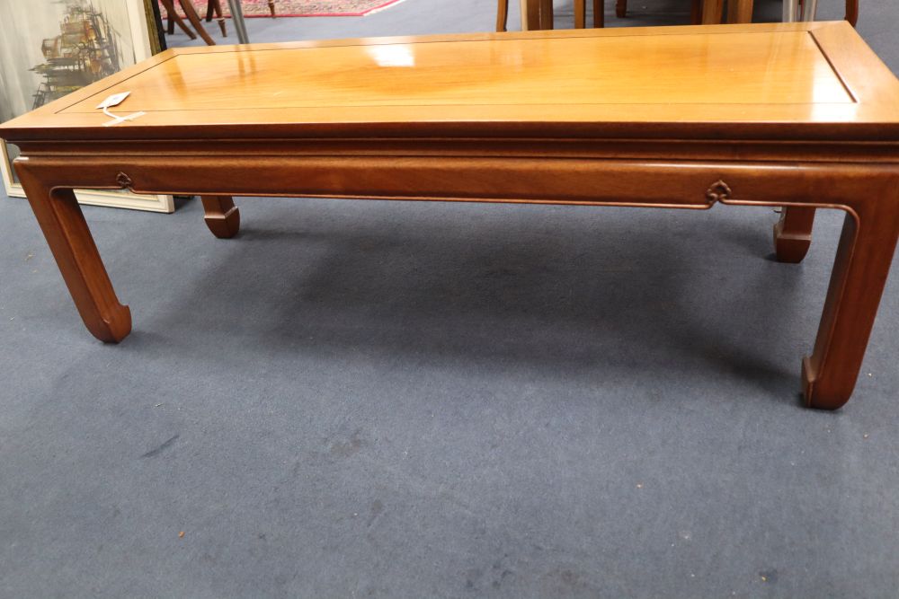 A Chinese hardwood coffee table, width 122cm, depth 46cm, height 40cm